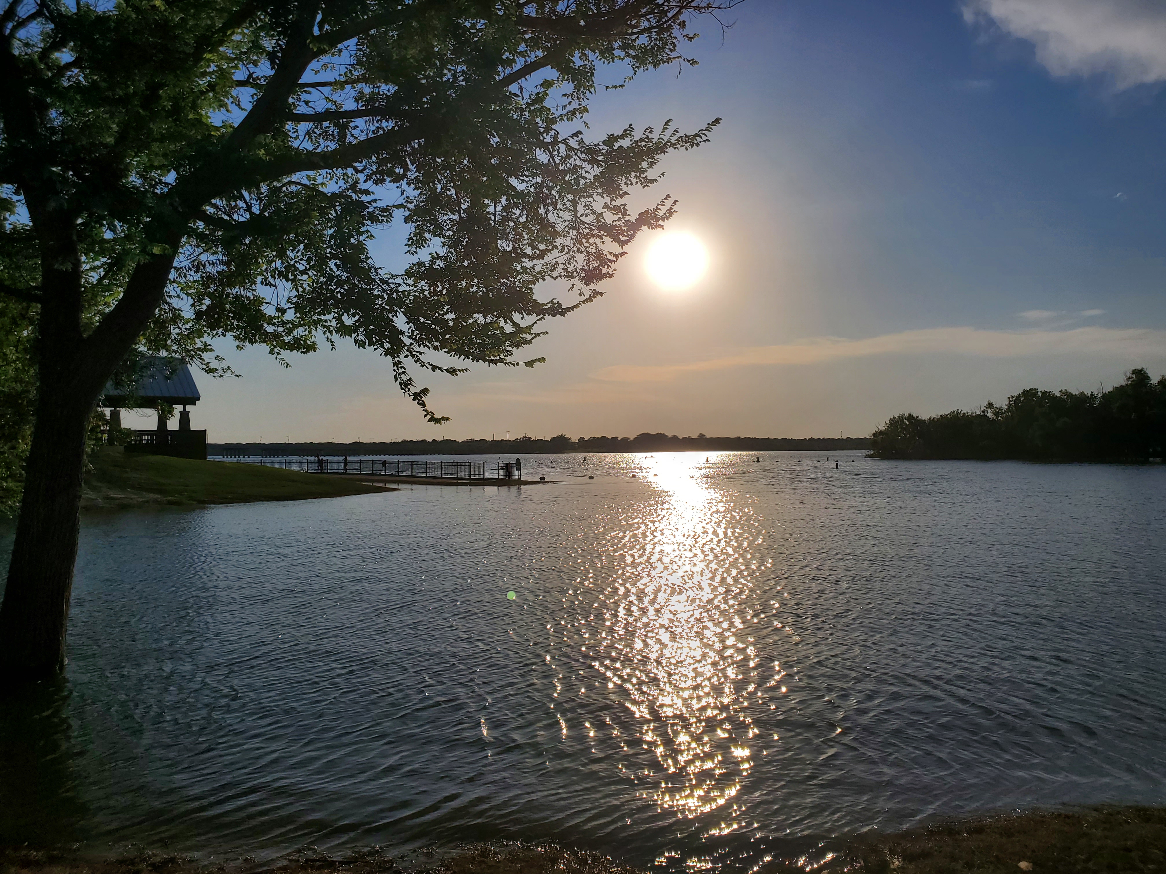 A nice, bankside view of the flooded lake. The sun is soon to set.